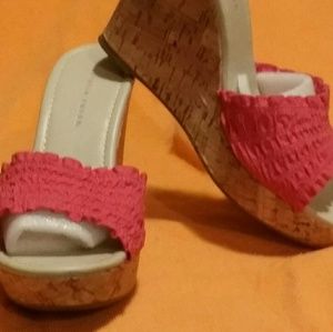 A pair of wedged sandals